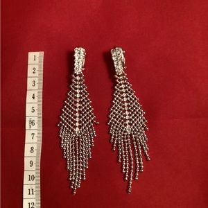 Long silver tone dangle clip on earrings